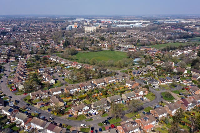 The average price tag on a home has dipped by more than usual for the month of July, Rightmove said (Steve Parsons/PA)