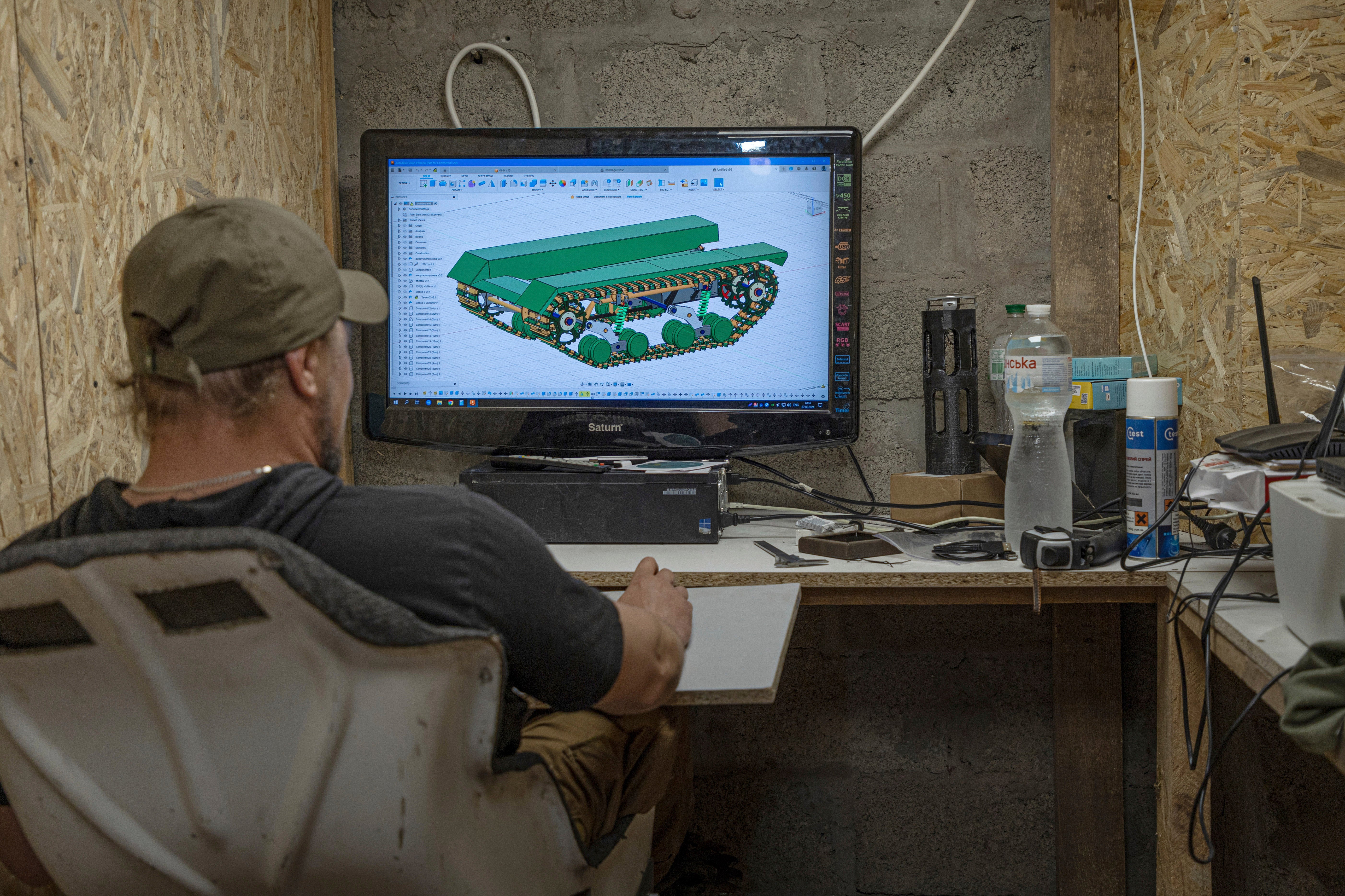 Serhii, chief engineer of design and production bureau ‘UkrPrototyp’, works on 3D model of a a car-sized 800-kilogram (1,750-pound) prototype drone, in the north of Ukraine