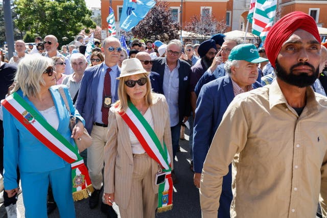 <p>People attend a demonstration against gangmastering and exploitation after the death of Satnam Singh in Latina, Italy, on 25 June 2024</p>