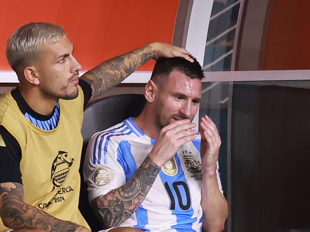 <p>Lionel Messi of Argentina reacts after an injury</p>