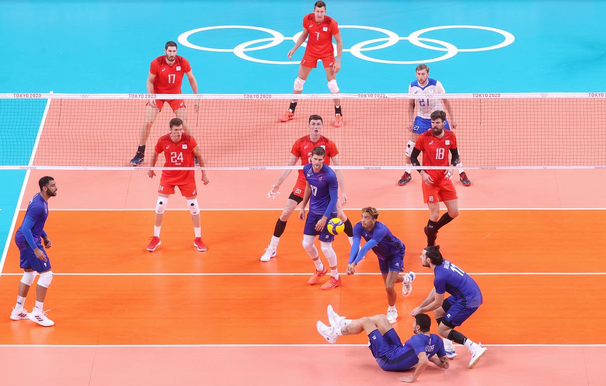 Why does one volleyball player wear a different colour jersey?