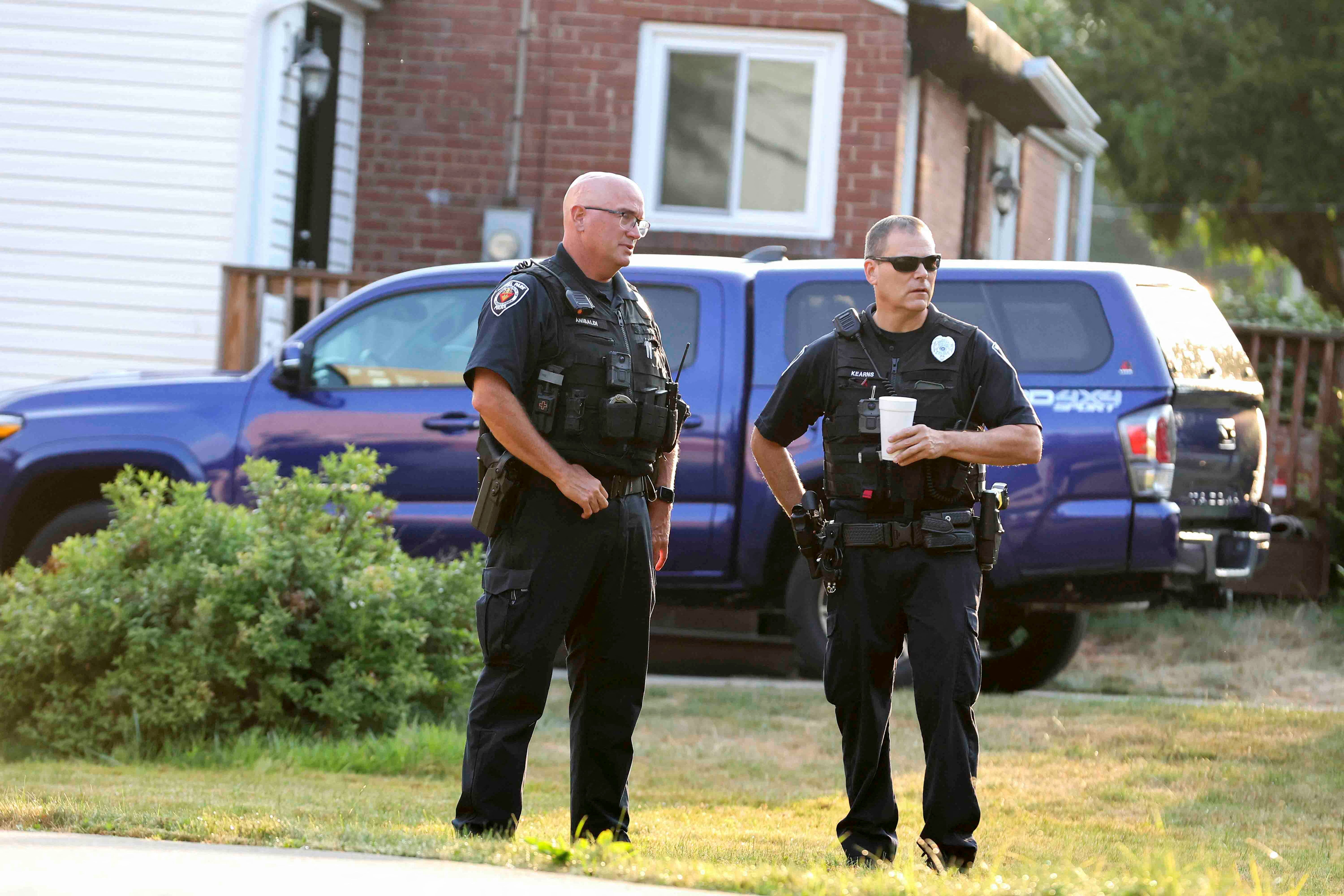 Bethel Park police officers outside the home of 20-year-old Thomas Matthew Crooks