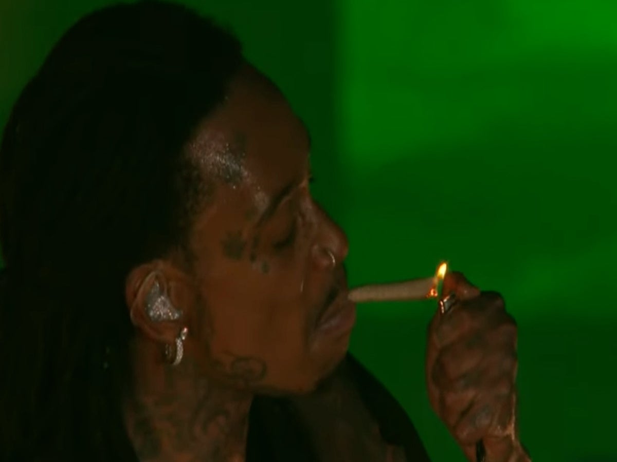 Wiz Khalifa lights joint on stage hours before being arrested for drug  possession