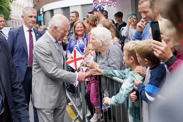 <p>Charles speaks to members of the public as he arrives at the Royal Square in St Helier, Jersey (Arthur Edwards/The Sun/PA)</p>