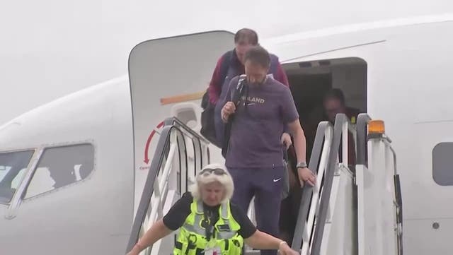 <p>Watch: Gareth Southgate leads England players down plane steps as they arrive back in UK after 2024 final defeat.</p>