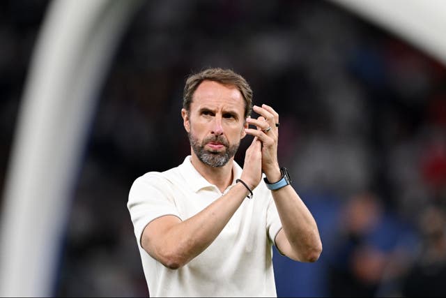 <p>Gareth Southgate applauds England fans after defeat to Spain</p>