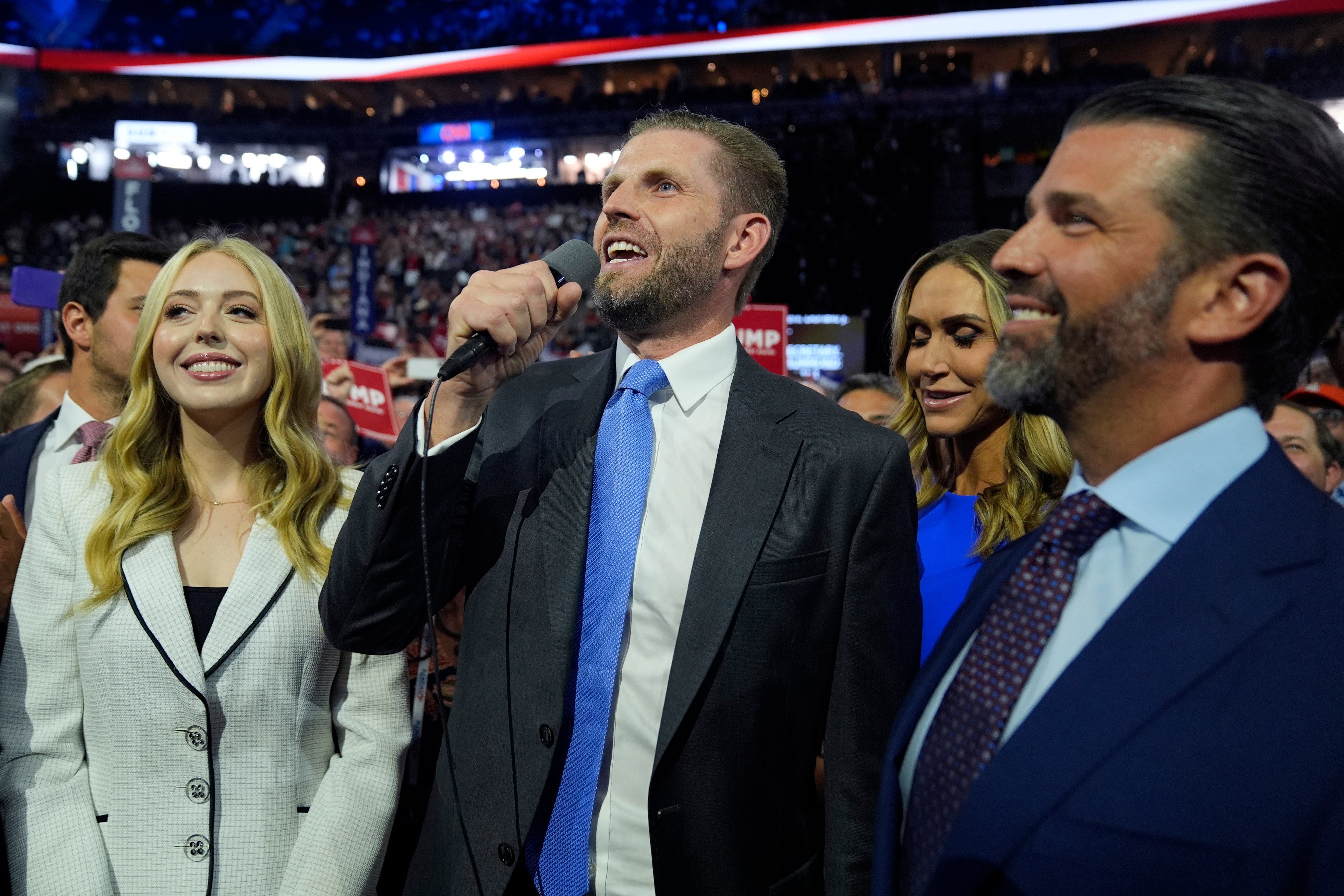 Eric Trump votes the Florida delegates for Republican presidential candidate former President Donald Trump during the roll call of states, as from left, Tiffany Trump, Lara Trump and Donald Trump Jr, watch