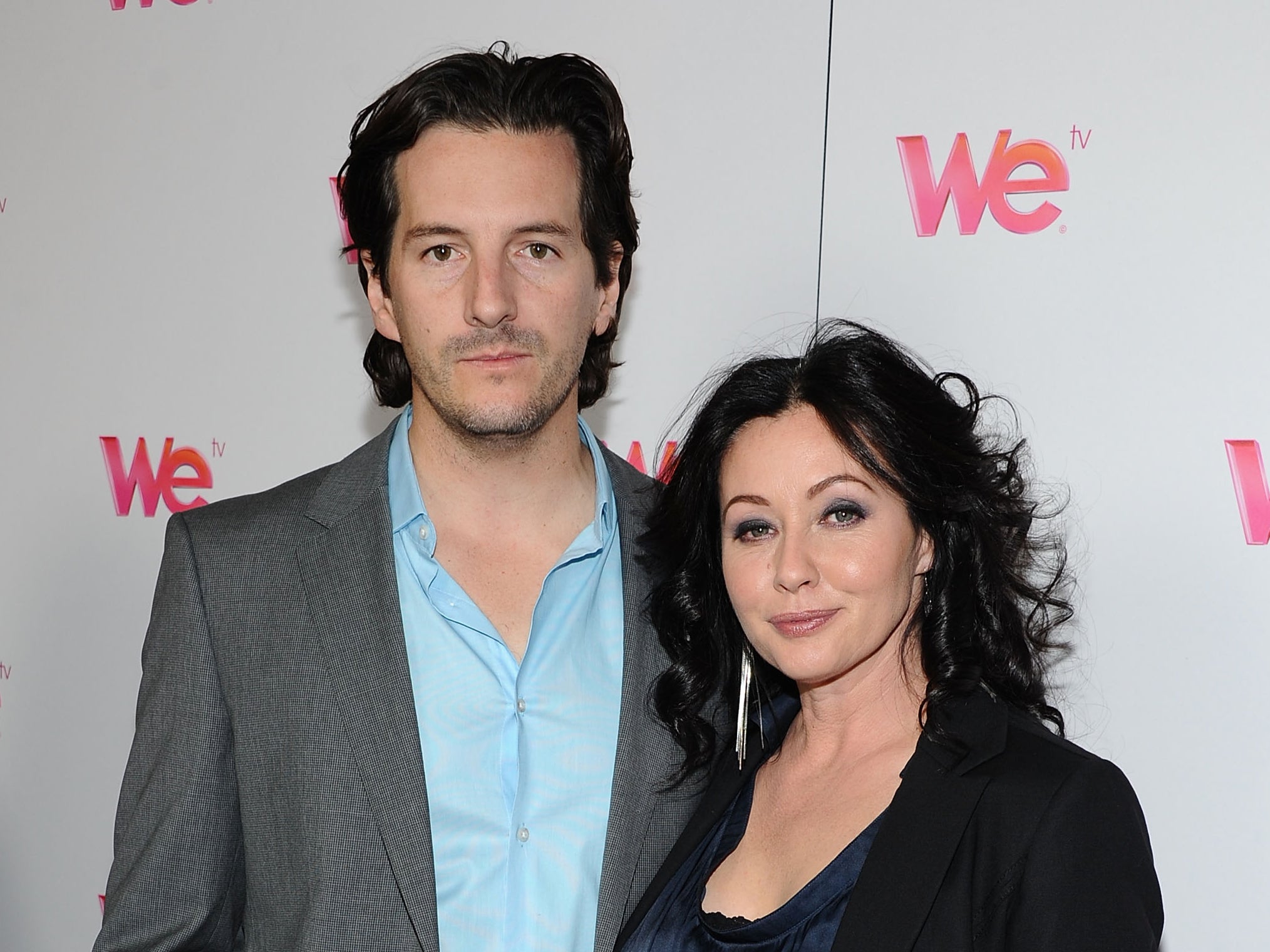 Photographer Kurt Iswarienko and actress Shannen Doherty arrive at WE tv’s ‘Family Affair’ 2012 Winter TCA event at Langham Hotel on 13 January 2012 in Pasadena, California (Angela Weiss/Getty Images)