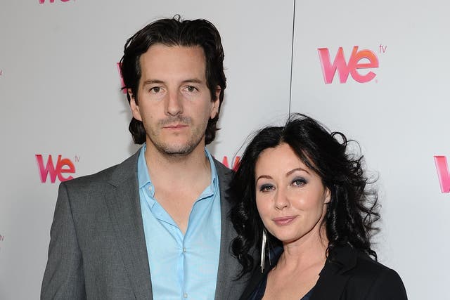 <p>Photographer Kurt Iswarienko and actress Shannen Doherty arrive at WE tv’s ‘Family Affair’ 2012 Winter TCA event at Langham Hotel on 13 January 2012 in Pasadena, California (Angela Weiss/Getty Images)</p>