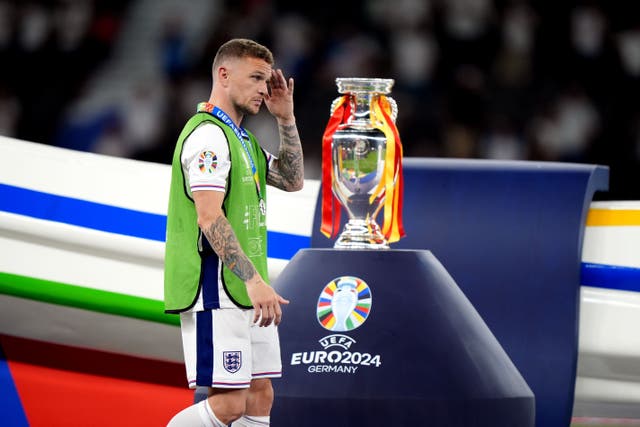 England’s Kieran Trippier walks past the trophy after the Euro 2024 final defeat to Spain (Bradley Collyer/PA)