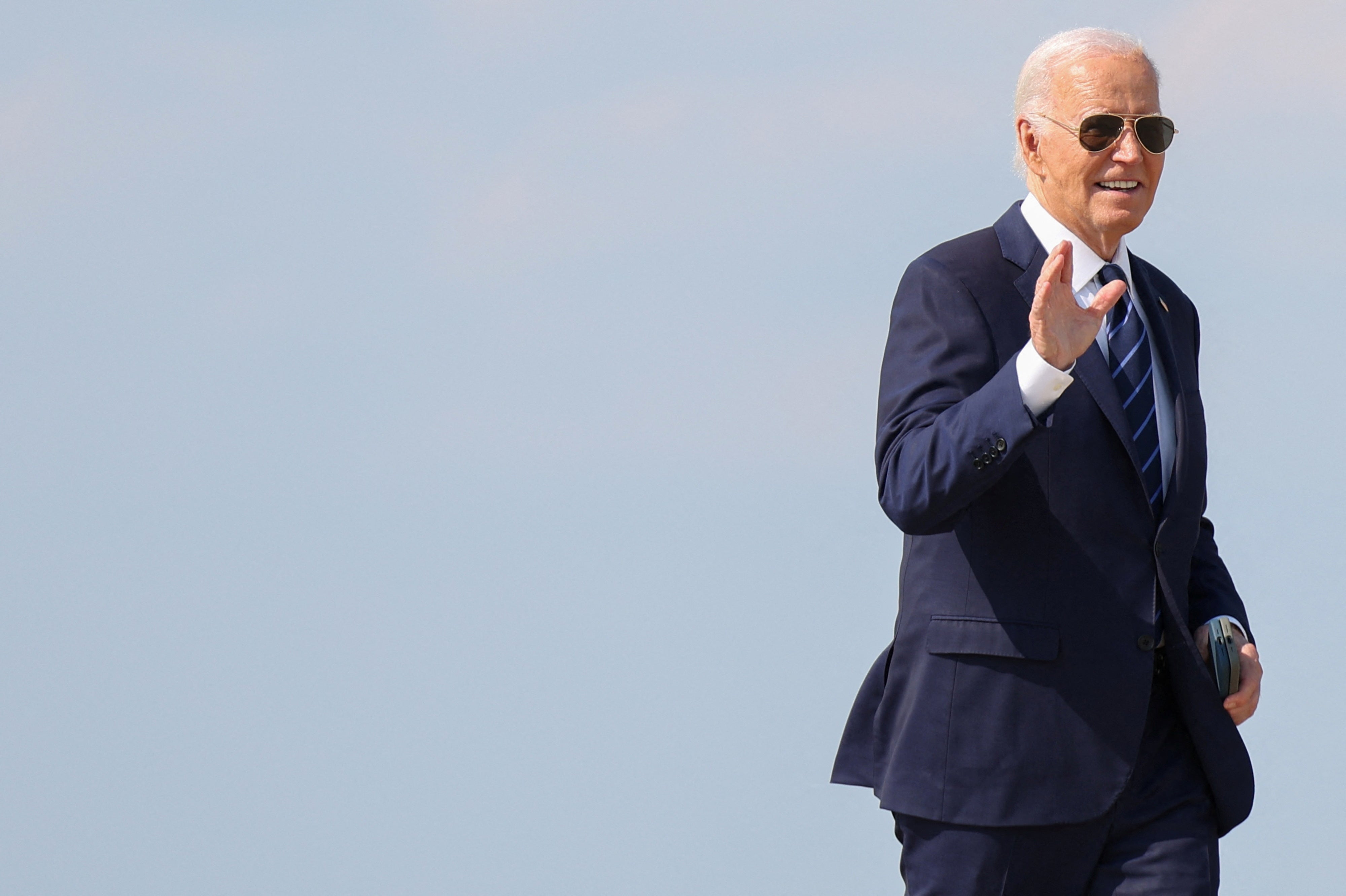 Biden greets supporters before boarding Air Force One after an interview with NBC News on July 15