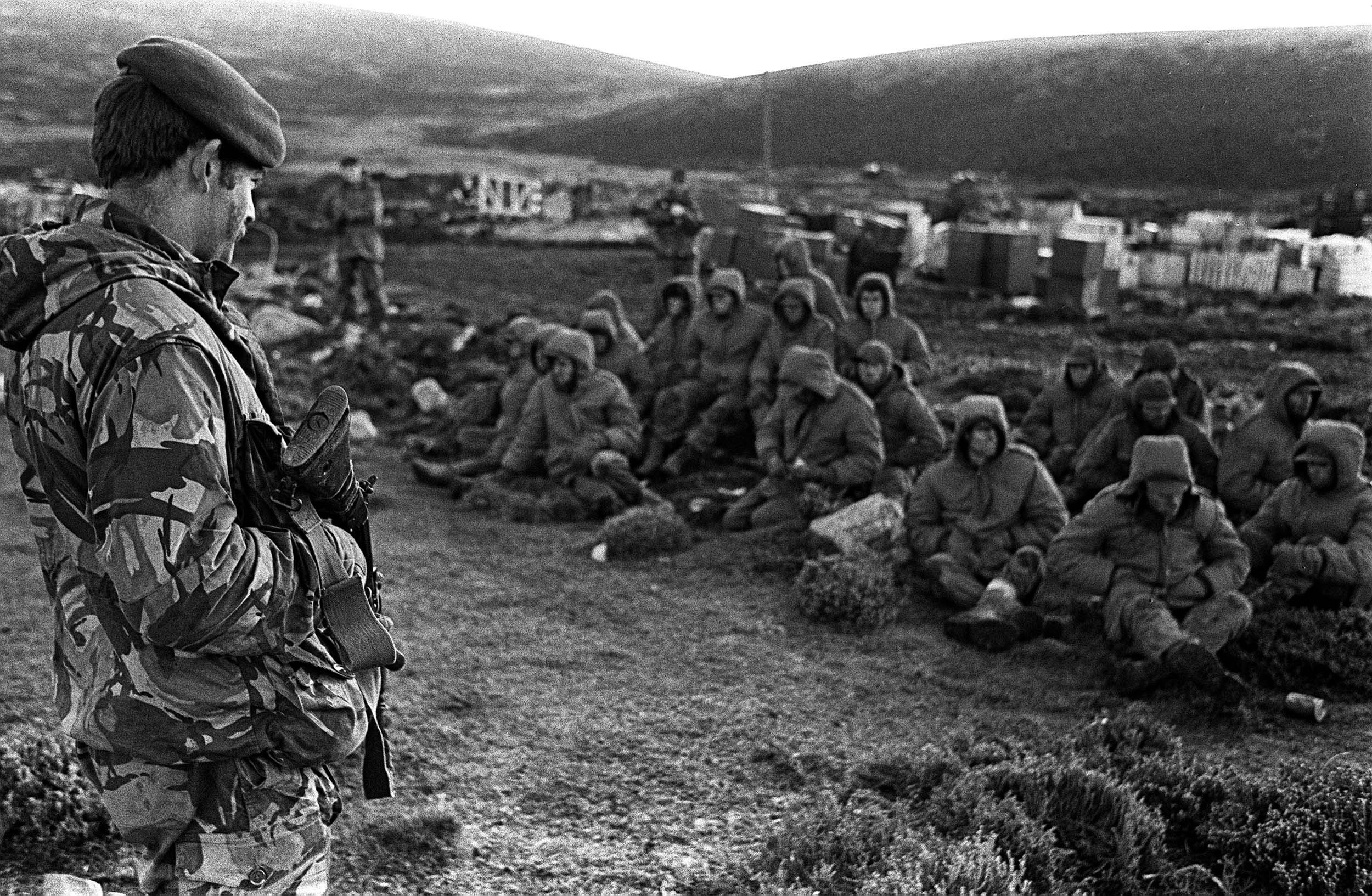 Four decades ago, the UK was equipped with far more resources. Argentinian soldiers captured during the Falklands war at Goose Green are seen being guarded by a British Royal Marine