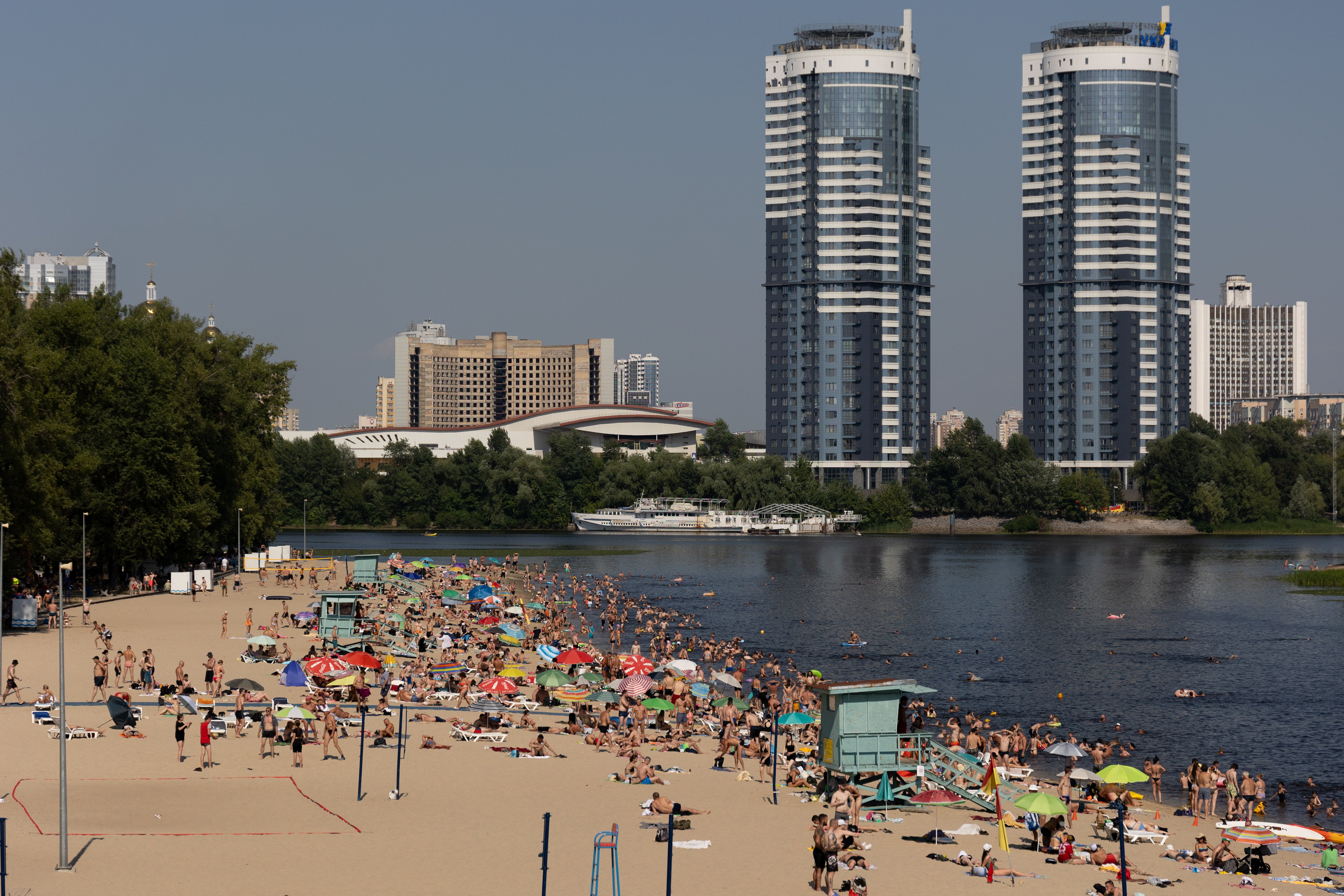 People relax on the town beach on July 14, 2024 in Kyiv, Ukraine