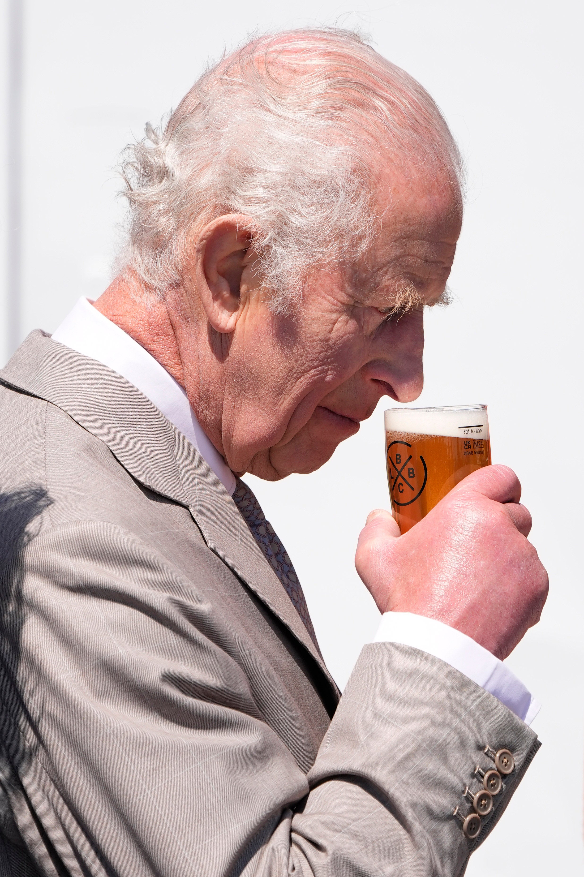 King Charles smelling ‘Charles’ beer.