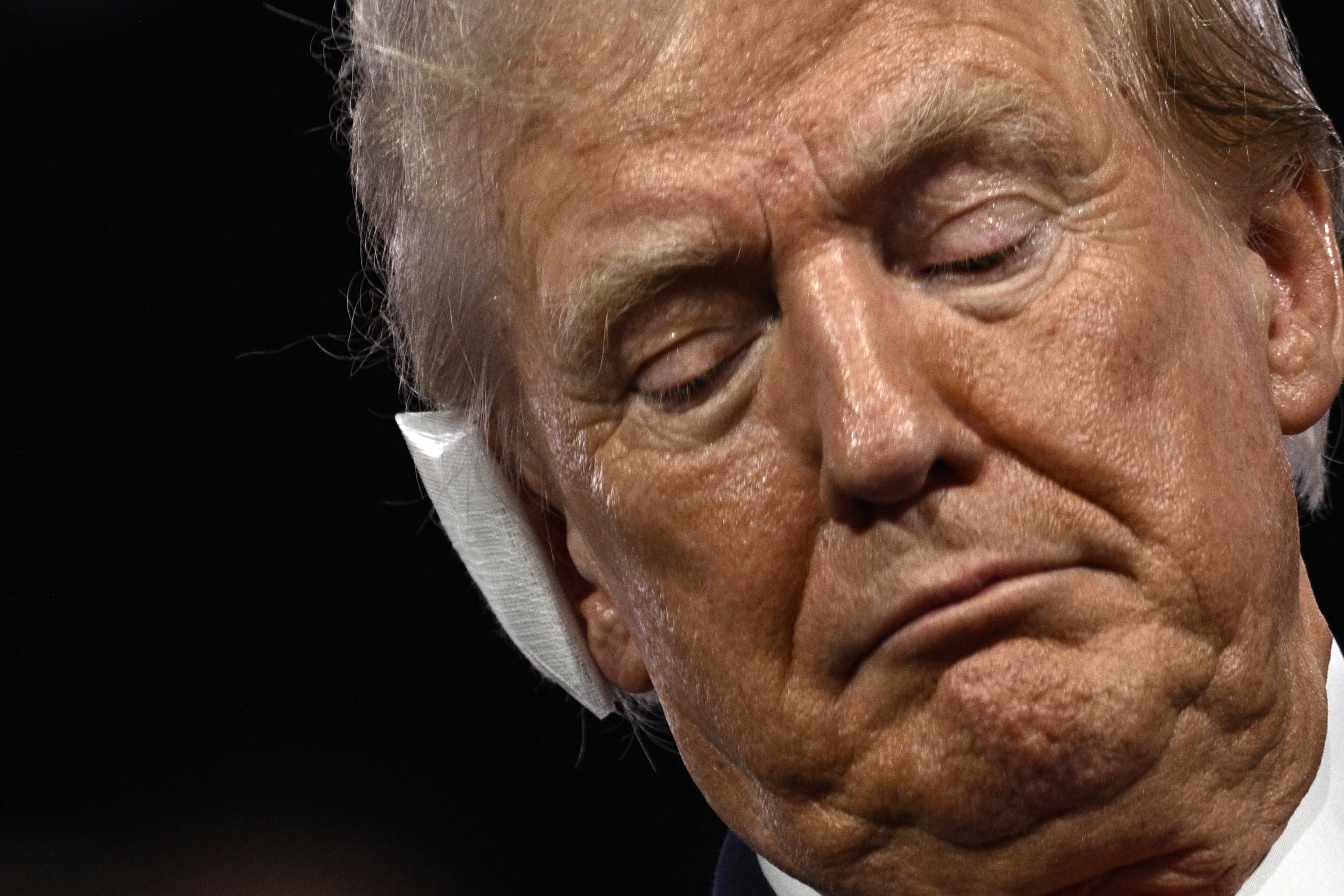 Donald Trump at the Republican National Convention with a bandage on his ear following his assassination attempt