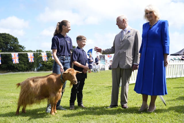 Charles and Camilla conferred the award on eight-year-old Summerville Tamsin at an event on Guernsey (Andrew Matthews/PA)