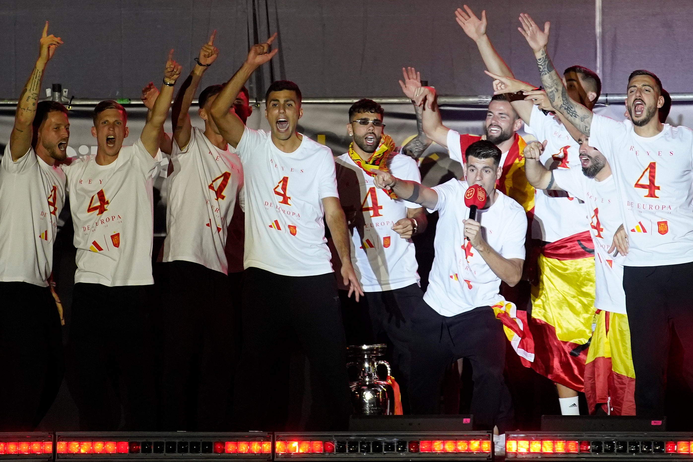 Alvaro Morata (holding microphone) and Rodri (centre) started chants at a Euro 2024 victory event