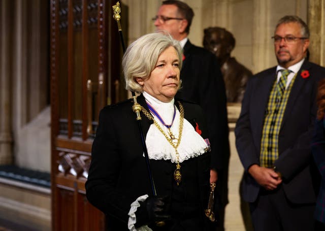 <p>Black Rod Sarah Clarke, walks through the Members’ Lobby at the Palace of Westminster (Hannah McKay/PA)</p>