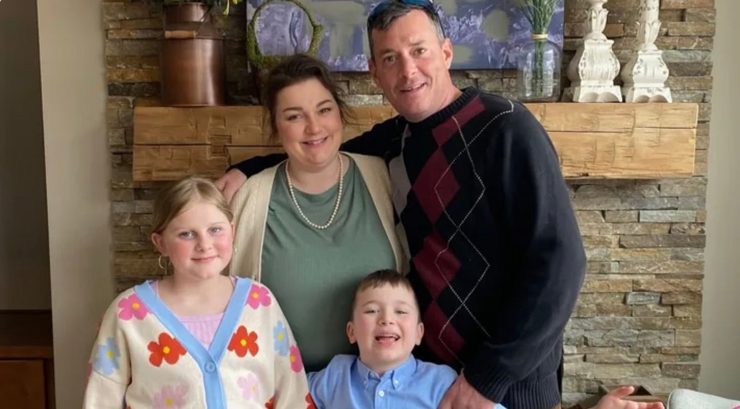 Cody Pope with his girlfriend, Cheryl Holzknecht, and their two children, Rowan, 10, left, and Calvin, 6, right. Pope died after being swept away by rushing waters trying to save the kids