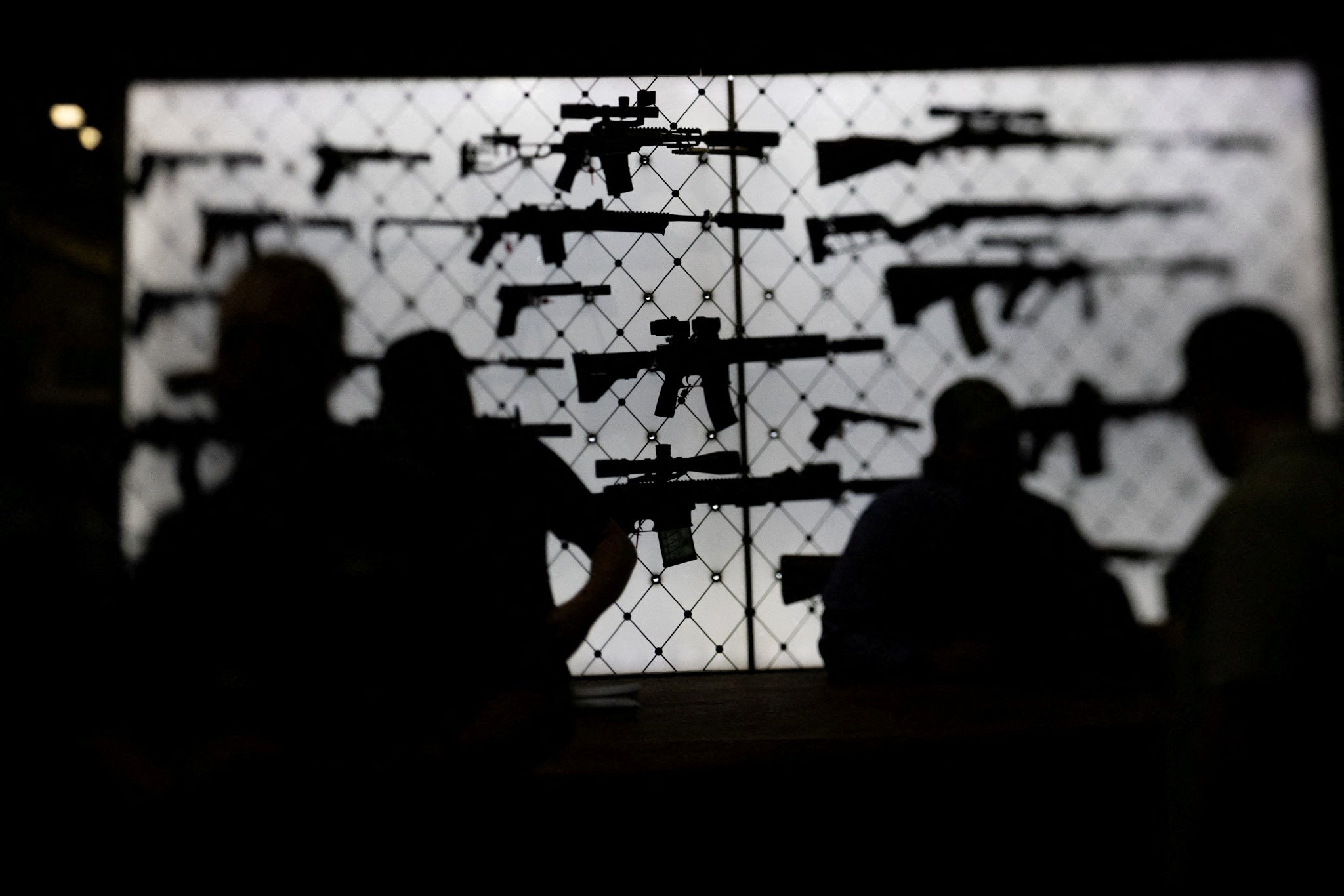 AR-15 rifles are displayed at an exhibition booth during the National Rifle Association’s annual convention in Dallas on May 18.