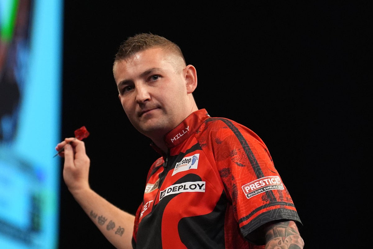 James Wade brings early end to Nathan Aspinall’s title defence