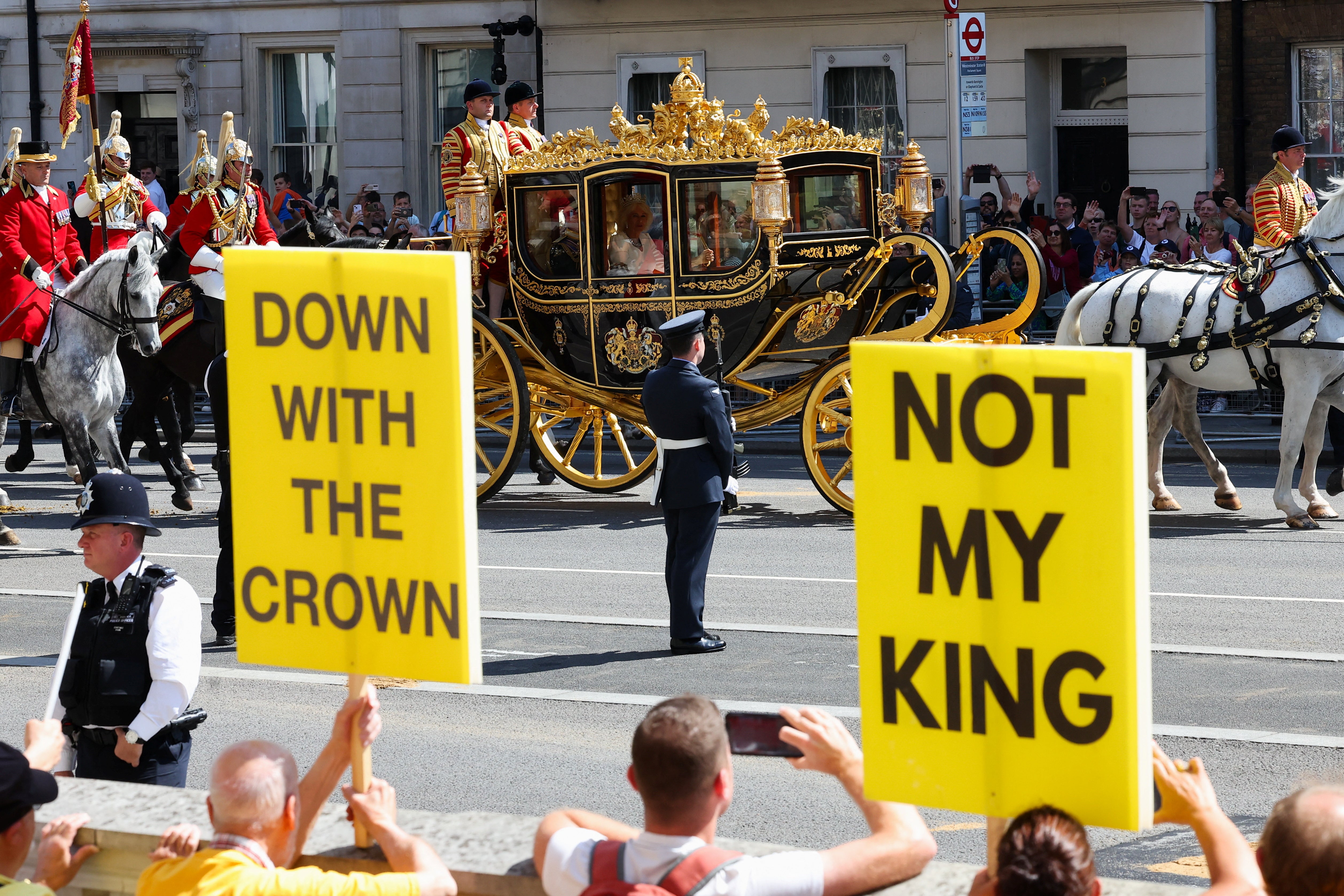 Members of anti-monarchy group Republic protest before the King’s Speech