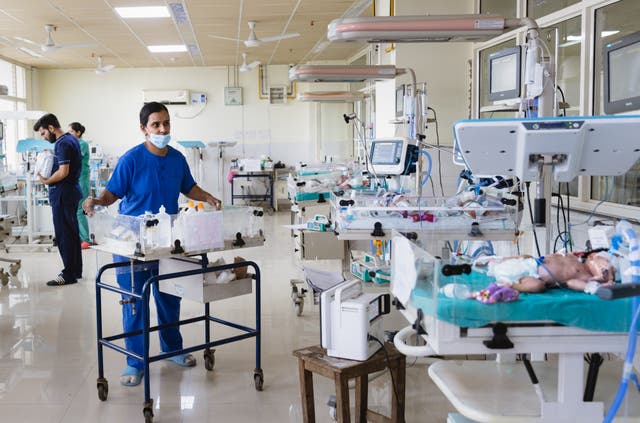 <p>Representative: A nurse checks the health of newborn babies in the neonatal intensive care </p>