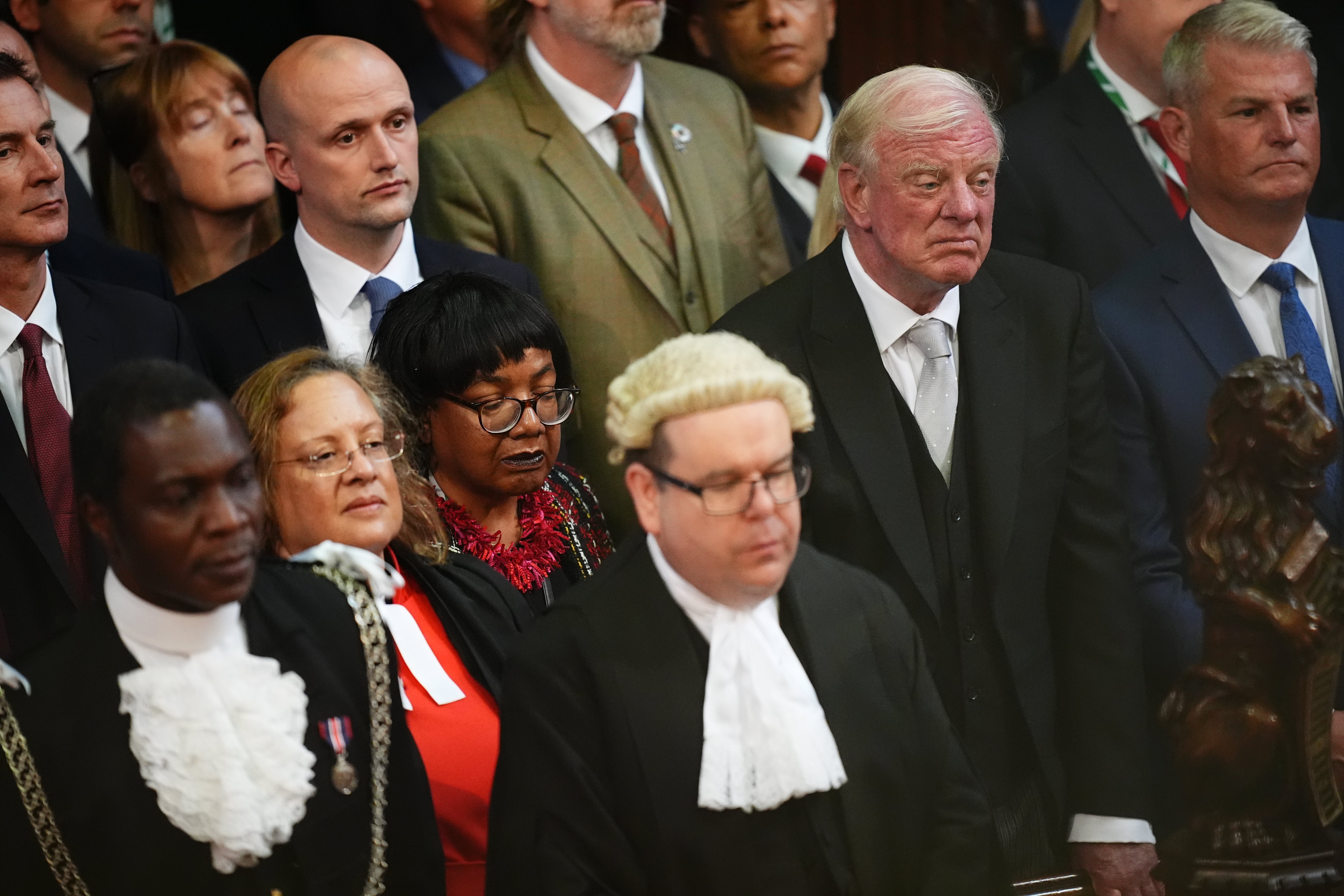 Members of the House of Commons, including SNP Westminster leader Stephen Flynn, Mother of the House Diane Abbot, and Father of the House Sir Edward Leigh, listen to the King's Speech during the State Opening of Parliament in chamber of the House of Lords