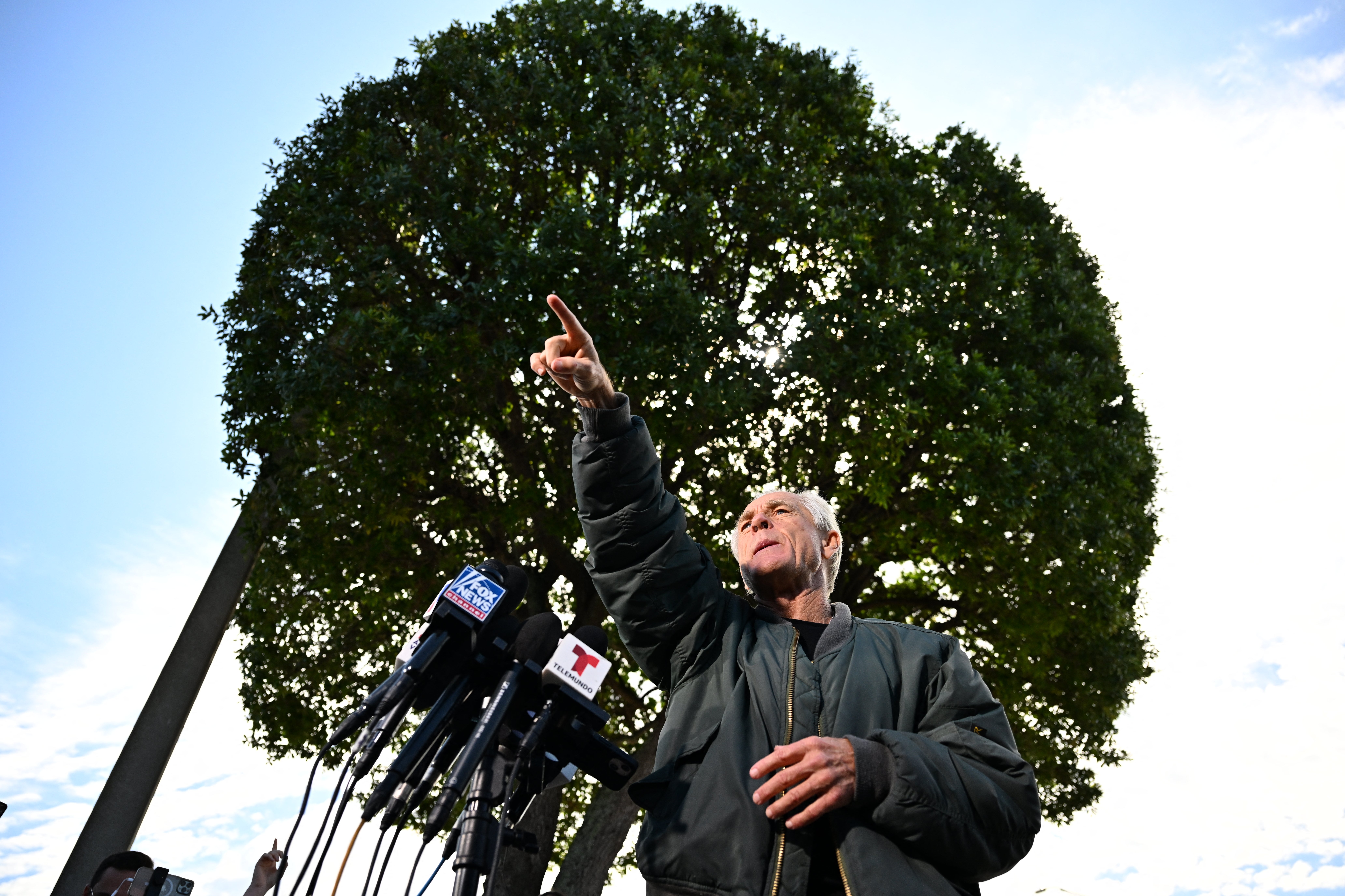 Peter Navarro, White House trade advisor to former US President Donald Trump, speaks to the press at the Country Mall Plaza before reporting to the Federal Correctional Institution, in Miami, Florida on March 19, 2024