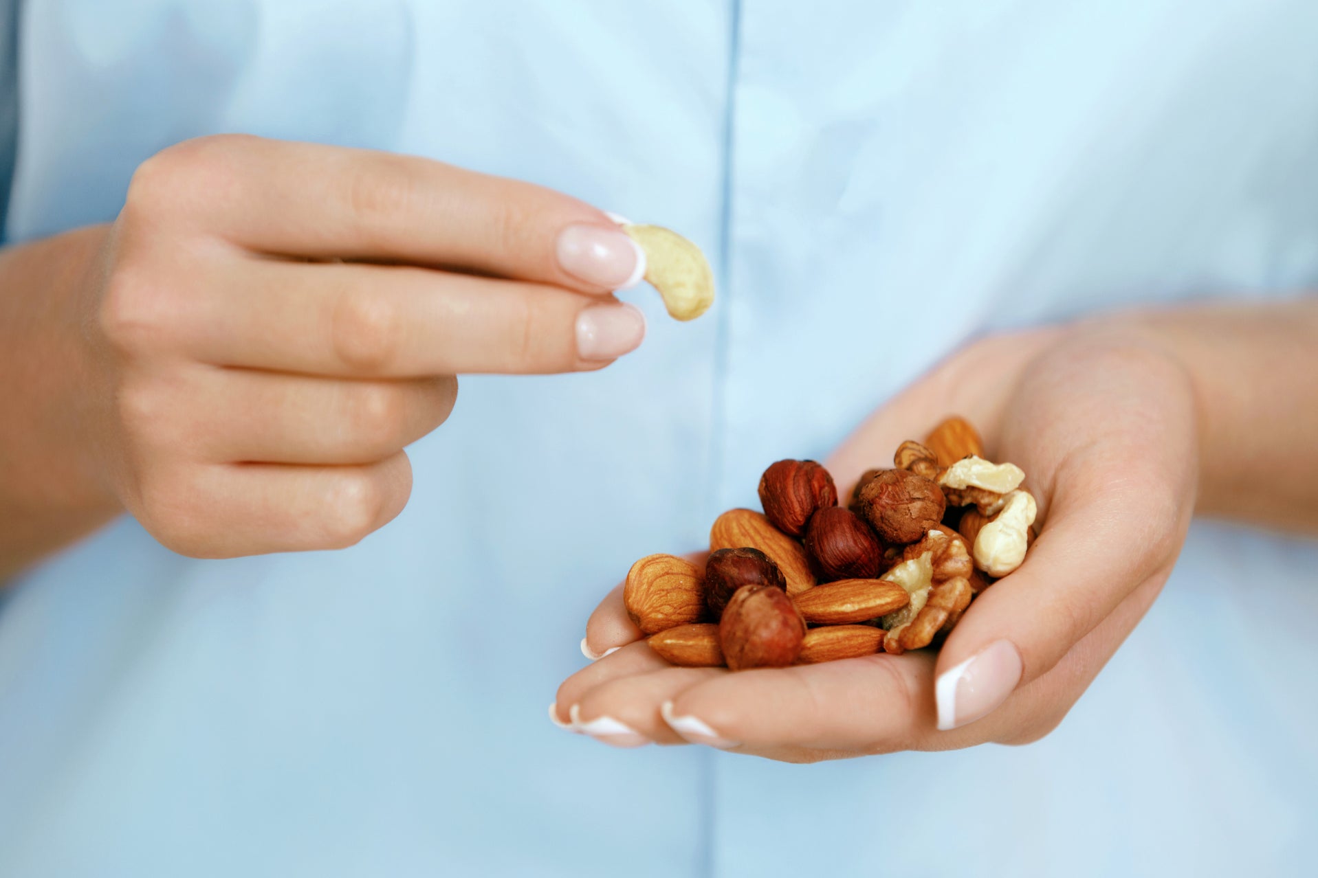 Little variety: a woman feasts on nuts