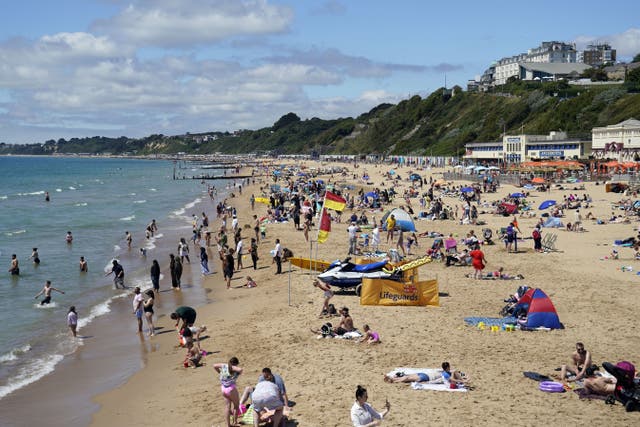 A warm spell is predicted in many areas following a rainy first half of July (Andrew Matthews/PA)