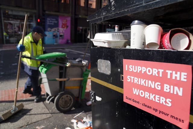 Union leaders have warned there could be ‘rubbish piling up in the streets’ after waste workers in councils voted for strike action in a dispute over pay (Andew Milligan/PA)