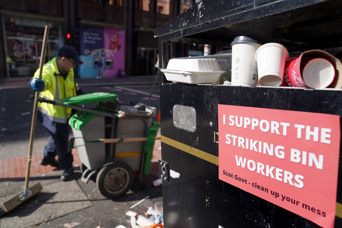 Strike vote by council staff could see rubbish piling up in streets, says union