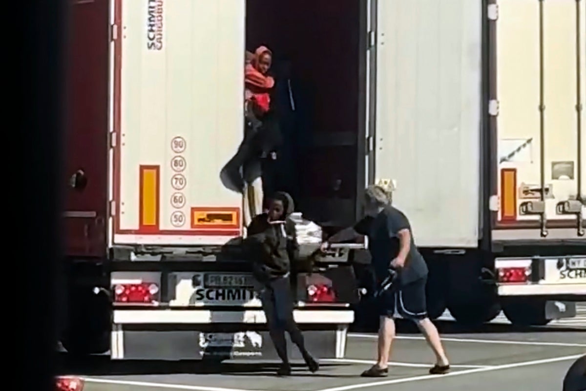 Police search for the truck driver who was filmed whipping female migrants on border