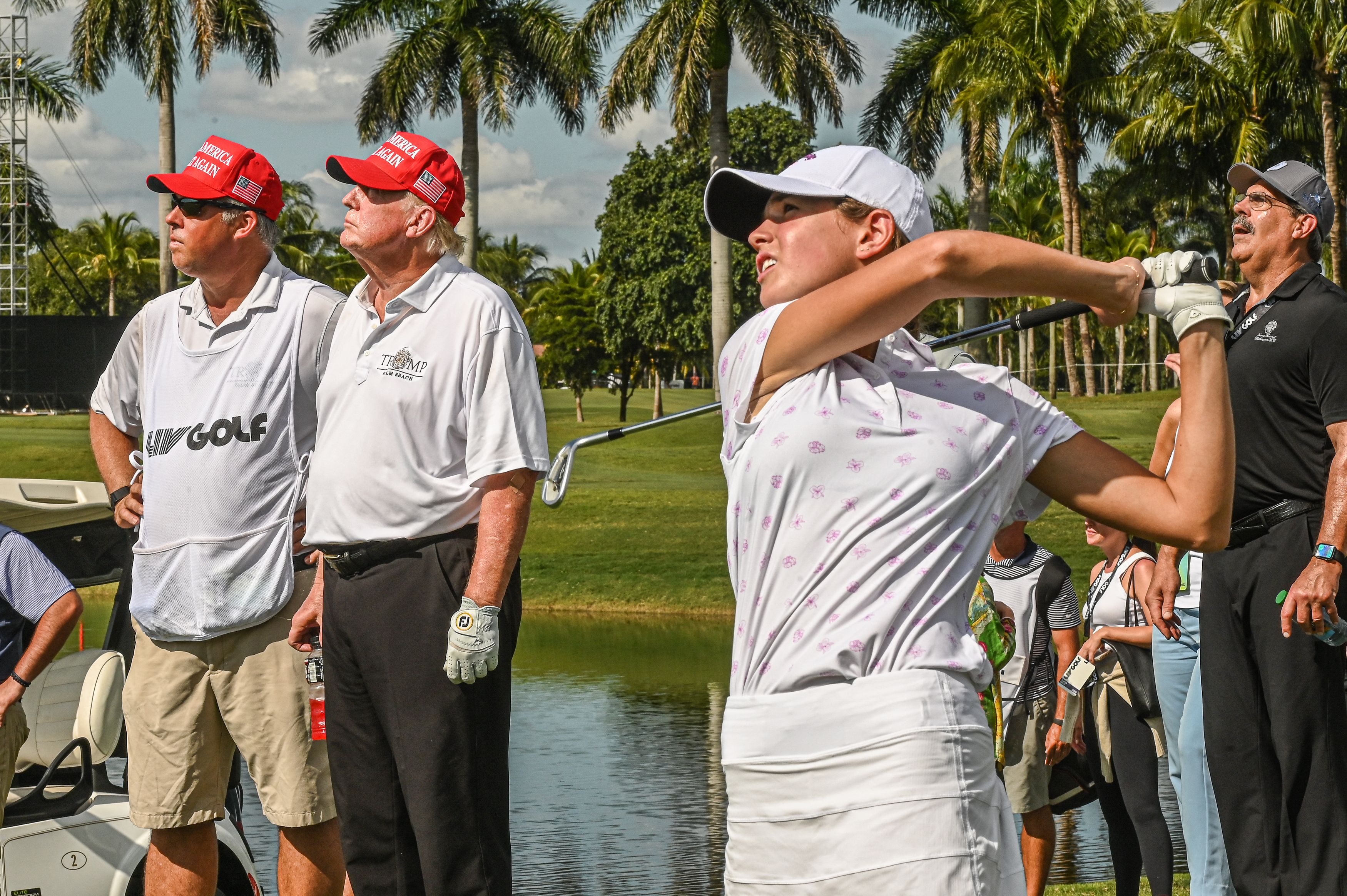 Trump watches his granddaughter play golf at Trump National Doral Miami golf club on October 27, 2022 in Miami, Florida