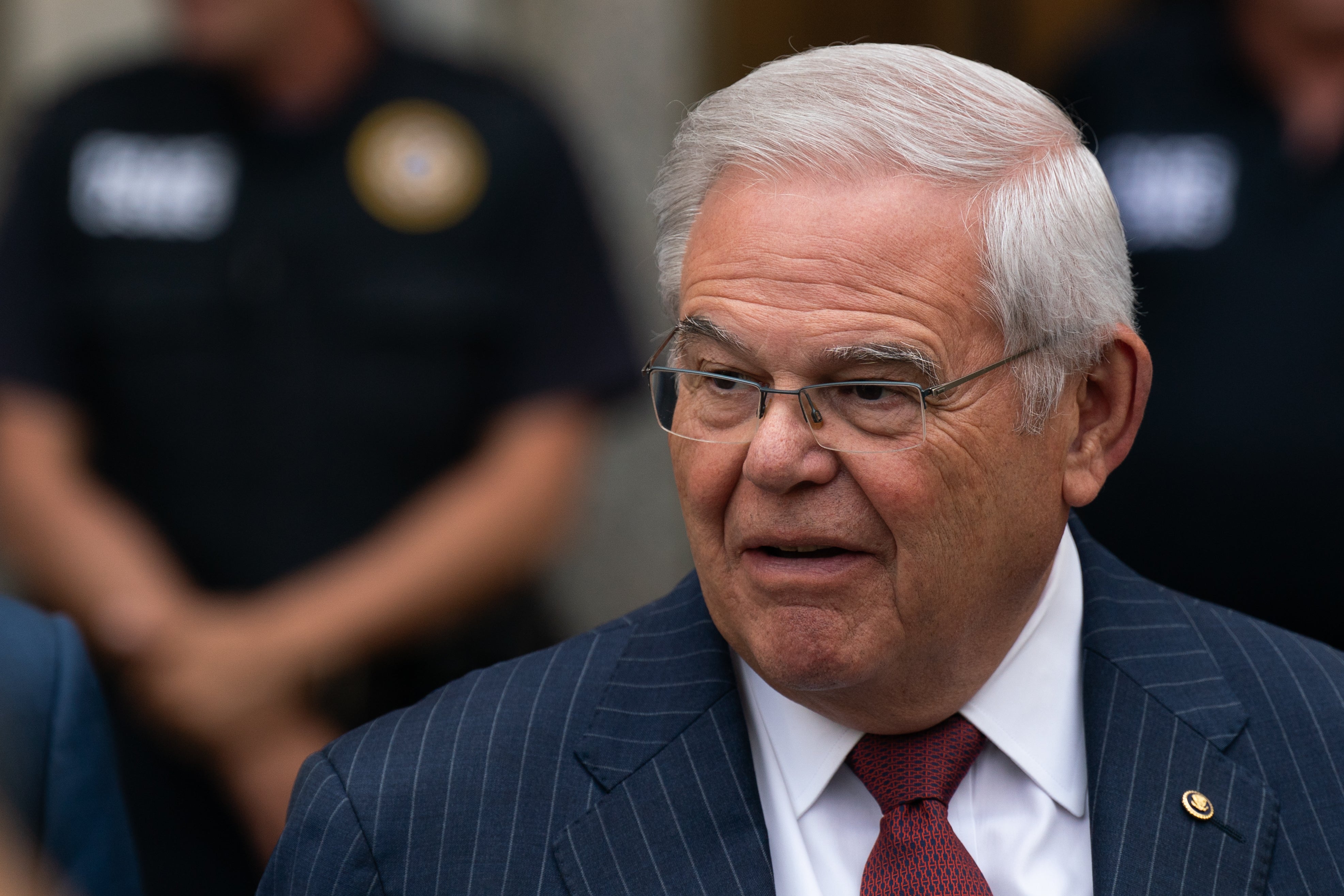 Senator Bob Menendez leaves a federal courthouse in New York after a jury convicted him on bribery and corruption charges. He has refuted a report that he plans to resign