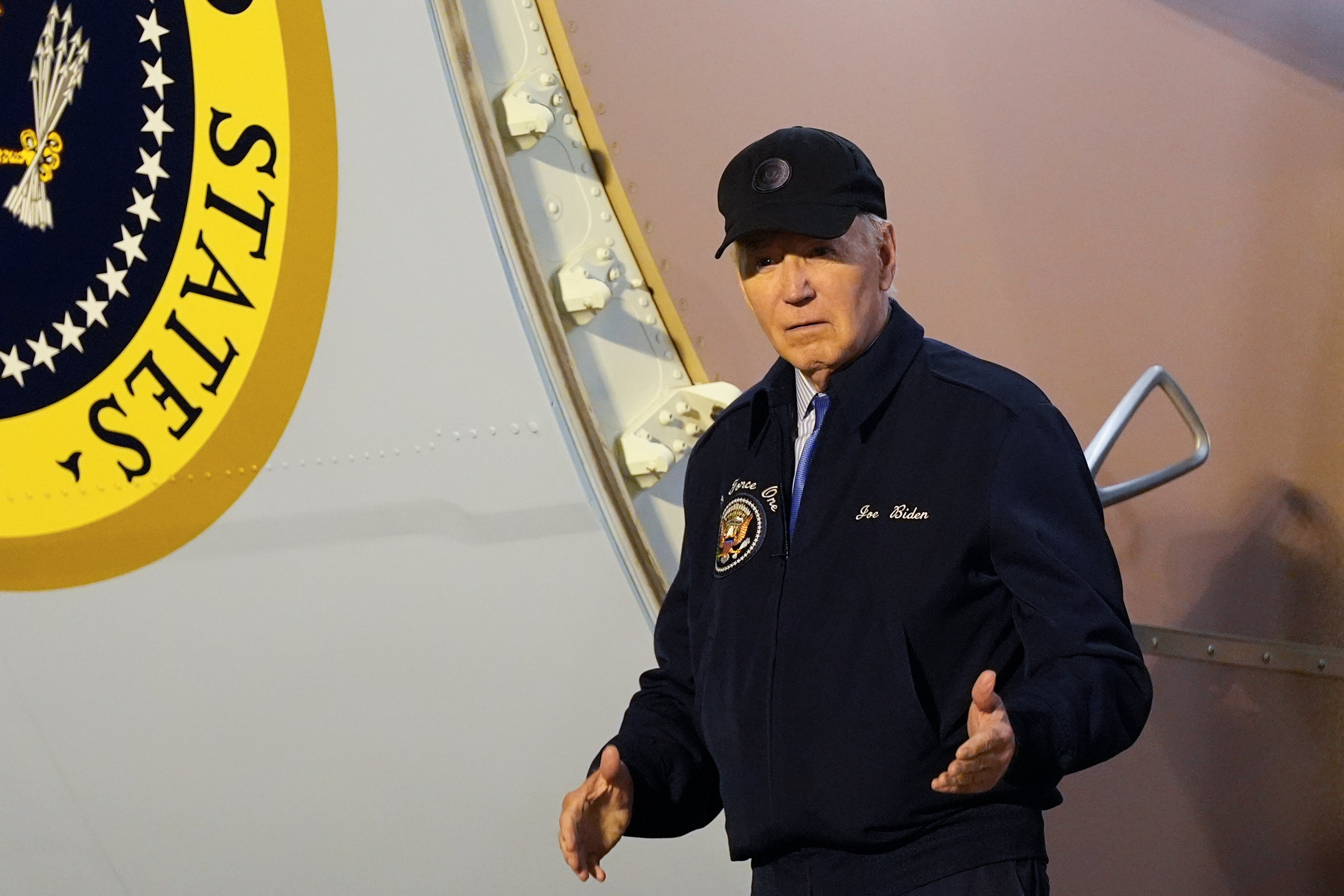 President Joe Biden walks down the steps of Air Force One at Dover Air Force Base in Delaware after abandoning his campaign trail in Las Vegas after Covid diagnosis on Wednesday