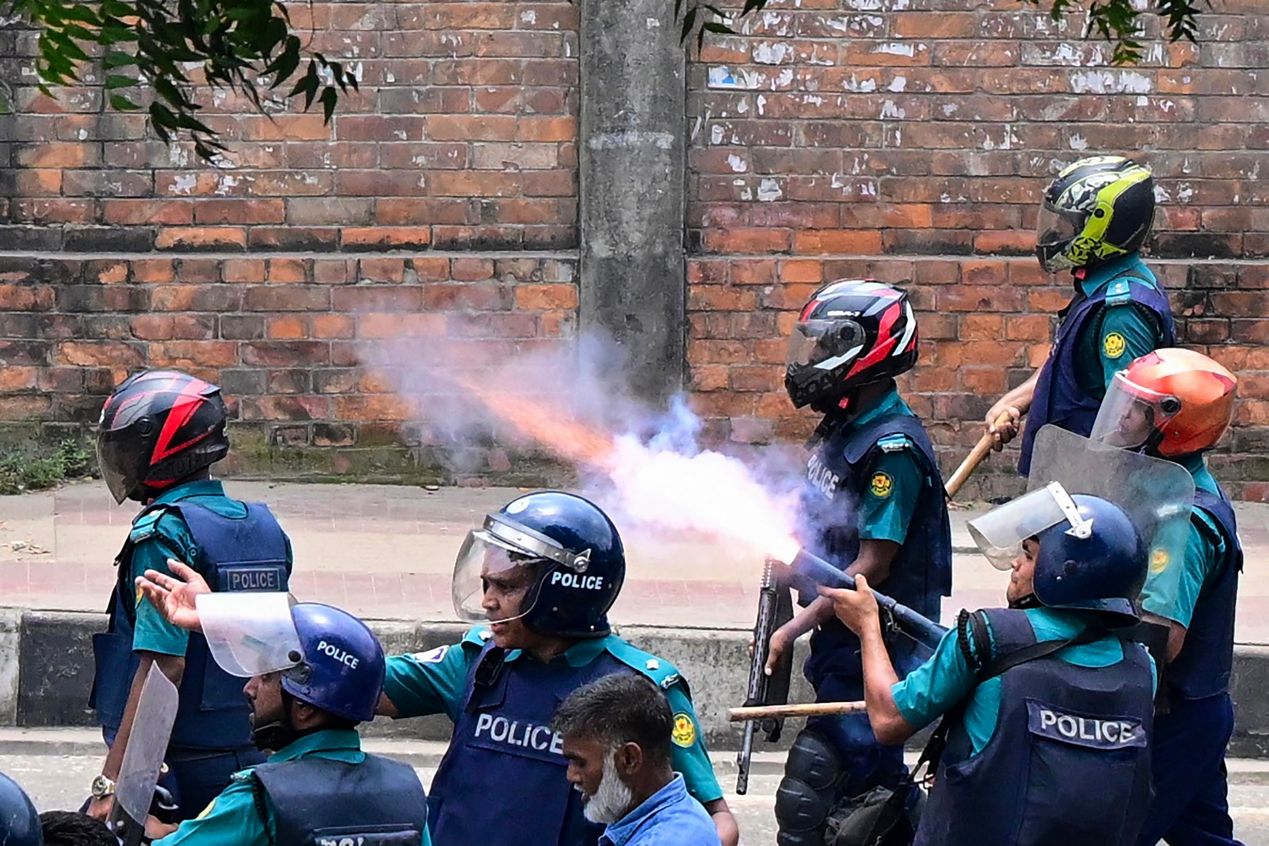 Bangladesh police fire tear shells to disperse anti-quota protesters