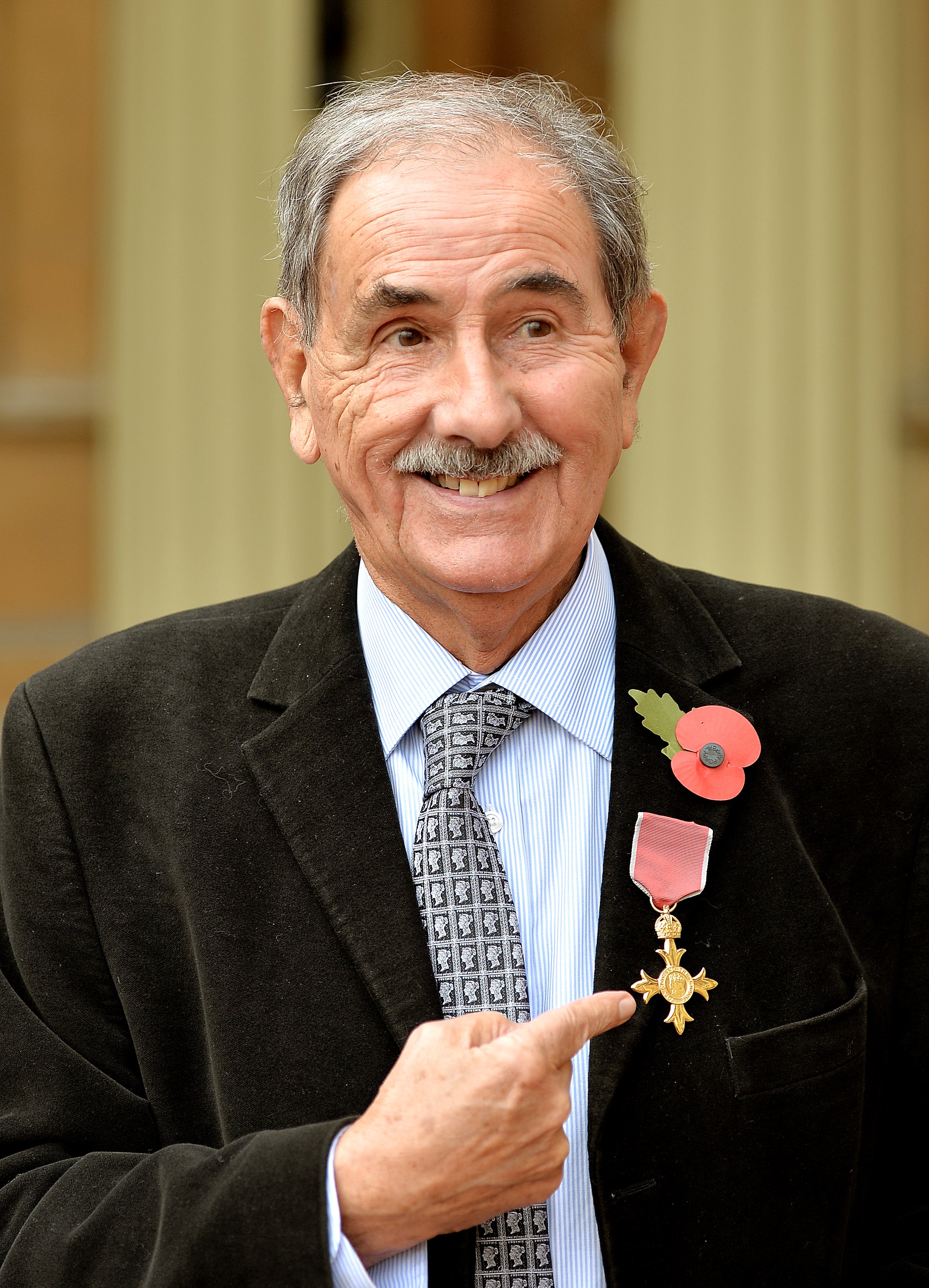 Davies after receiving his OBE in 2014