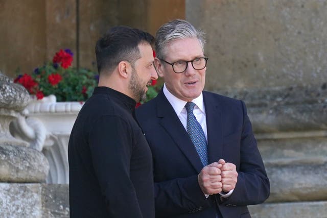 Sir Keir Starmer greets Ukrainian President Volodymyr Zelensky as he arrives to attend the European Political Community summit at Blenheim Palace (Jacob King/PA)