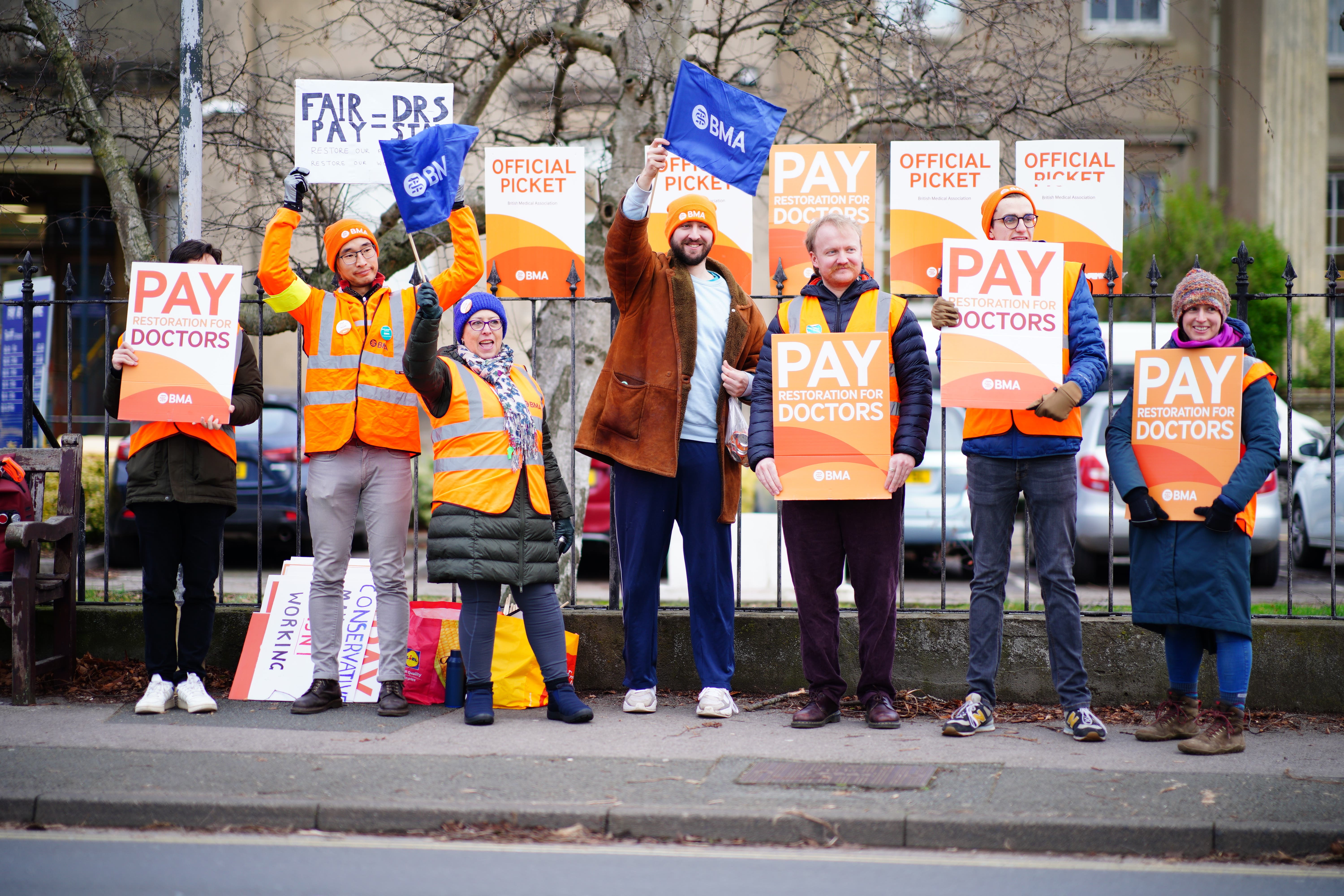 Junior doctors and members of the British Medical Association (BMA) on the picket line outside Cheltenham General Hospital during their dispute over pay (Ben Birchall/PA)