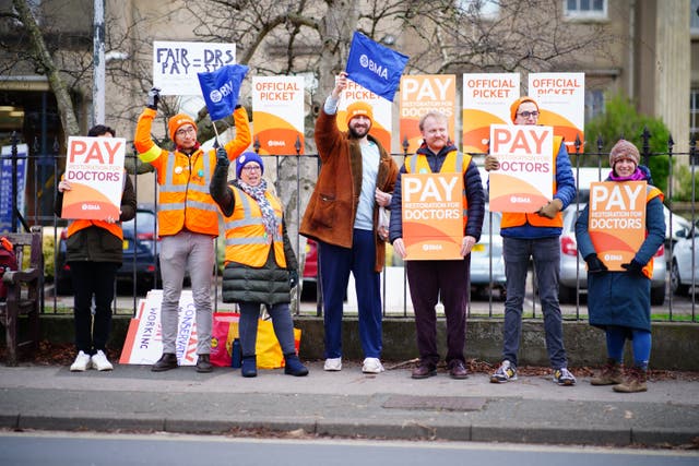 <p>Junior doctors and members of the British Medical Association (BMA) on the picket line outside Cheltenham General Hospital during their continuing dispute over pay (Ben Birchall/PA)</p>