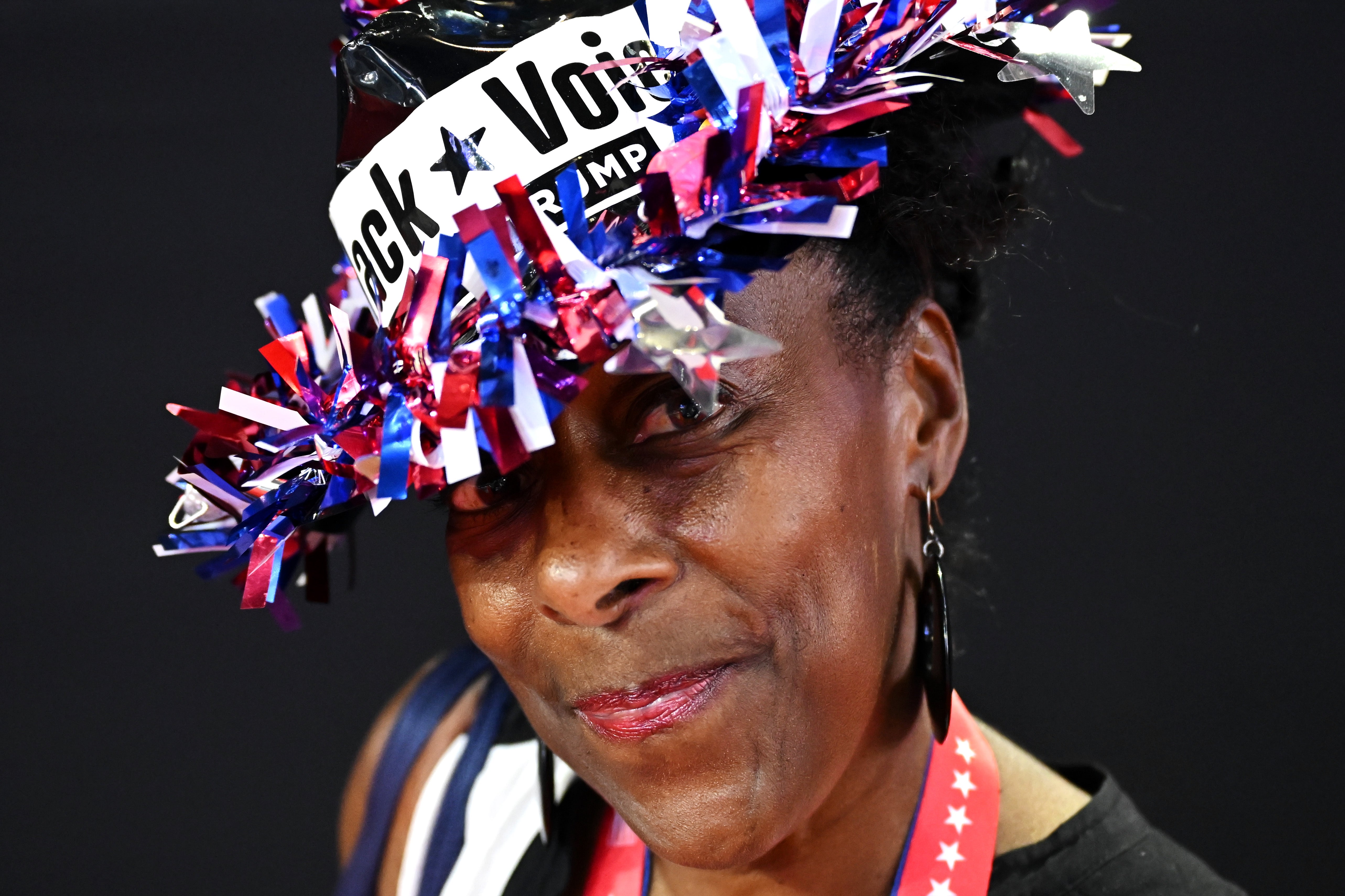 Illinois delegate Adrian Wright poses wearing a ‘Black voices’ hat