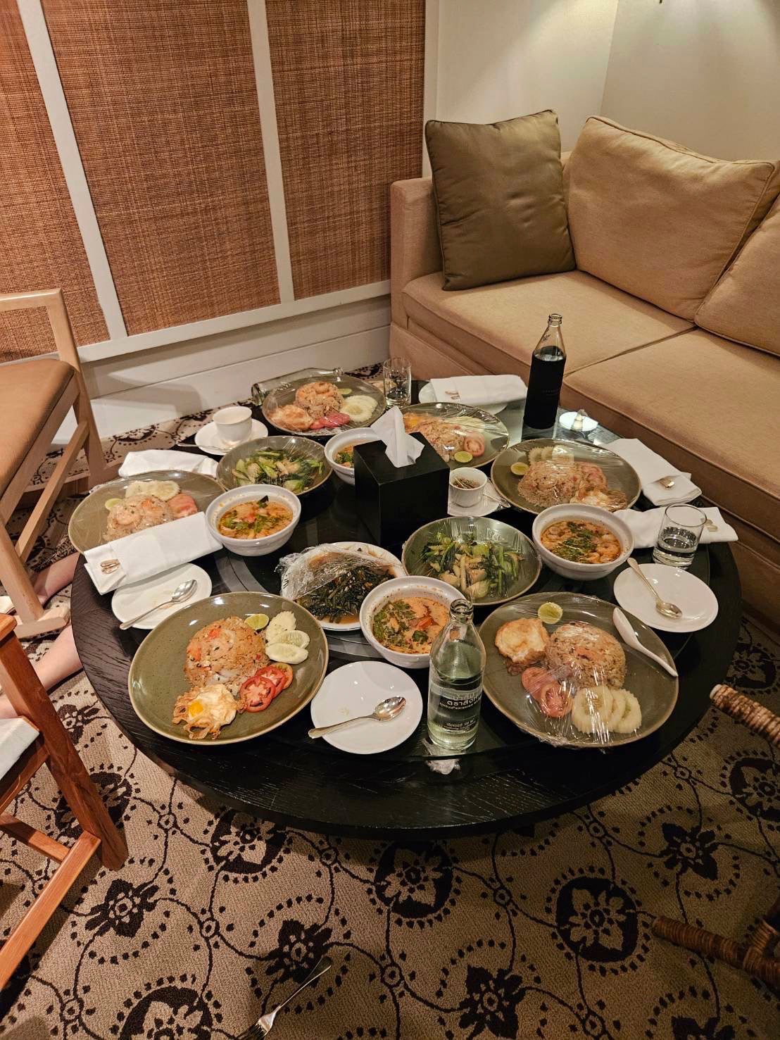 In this photo released by the Royal Thai Police, uneaten meals are left on a table in a room in the Grand Hyatt Erawan Hotel room where six people were found dead