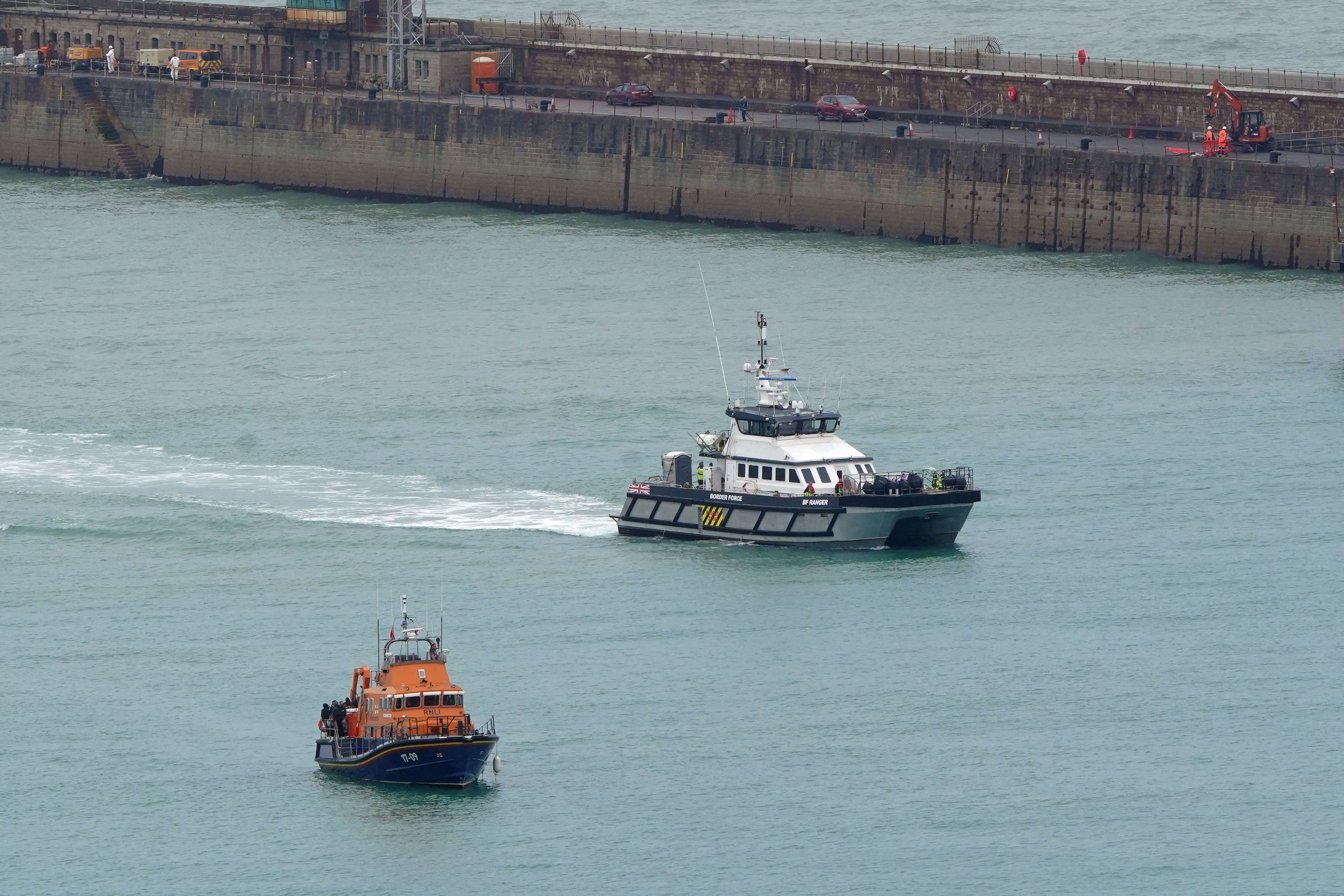 An RNLI Lifeboat and a Border Force vessel aided the rescue operation (PA)