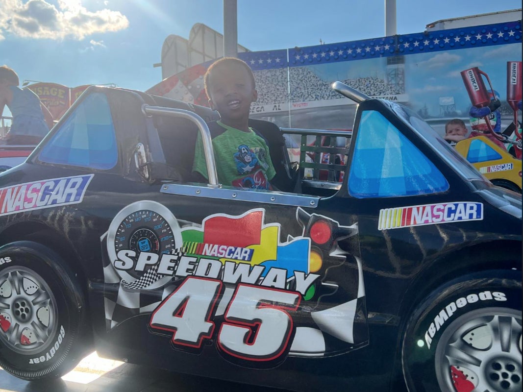 Jamison Beck, 4, is pictured here in a toy car. Jamison Beck was fatally hit by a car after he wandered out of his house in the middle of night on July 8