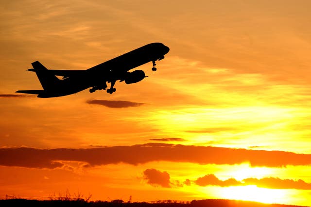 A plane leaving Newcastle Airport (Owen Humphreys/PA)