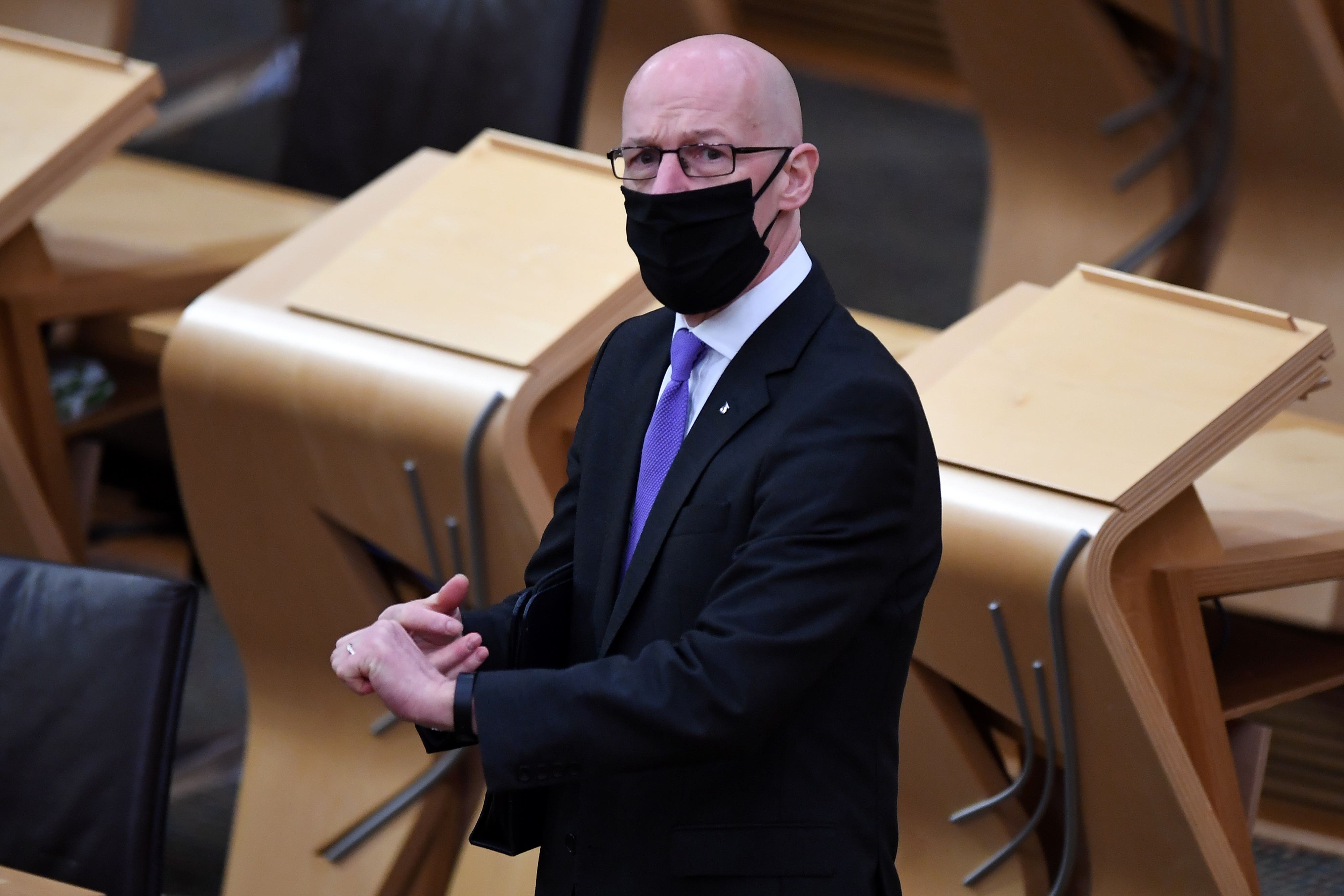 John Swinney, now the First Minister, was Scotland’s Covid Recovery Secretary from May 2021 (PA)