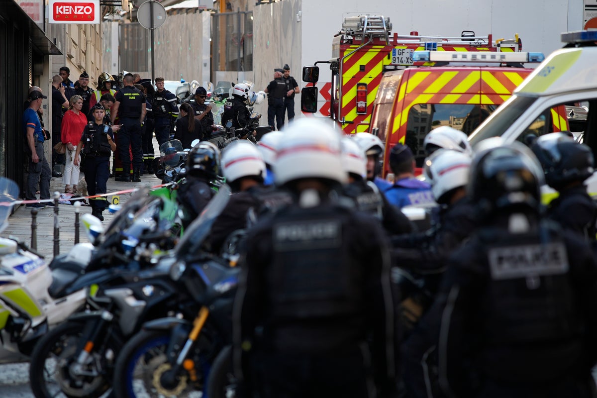 A police officer has been wounded in a knife attack in Paris, France's interior minister says