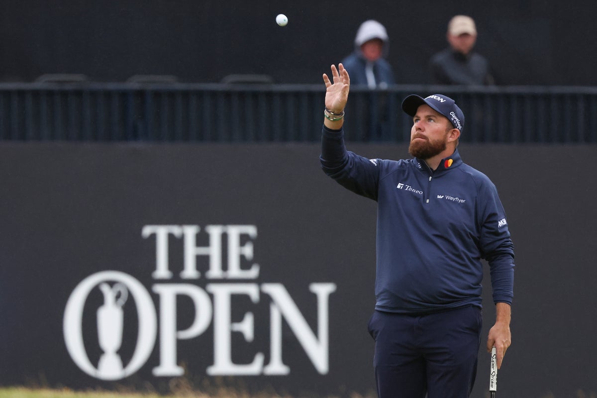 Dan Brown makes late birdies for a 1-shot lead over Shane Lowry in wind-challenged British Open